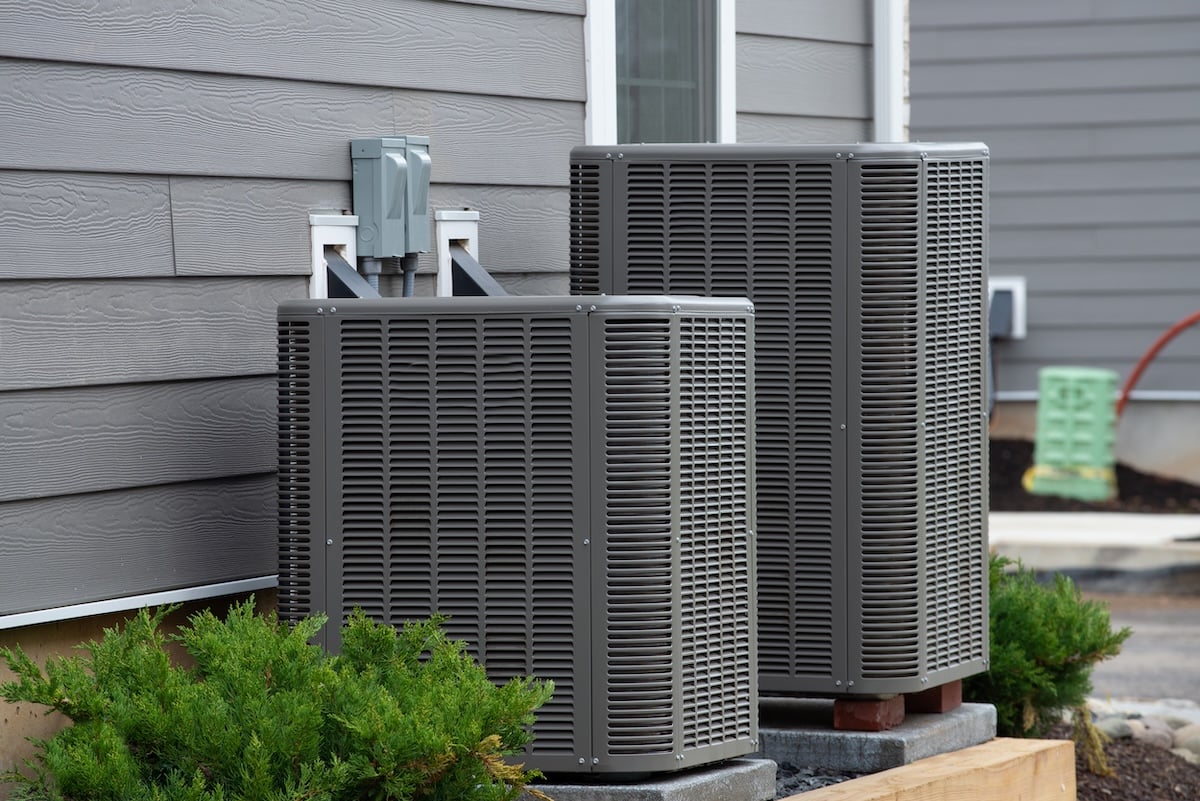 air conditioner near the house unit compressor cool fan system cooler