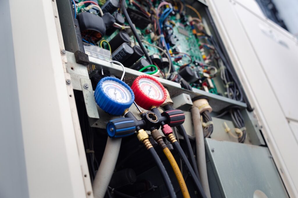 hvac tools Air conditioning service,HVAC Using a gauge to check the refrigerant in the system. Concept of inspection and maintenance services