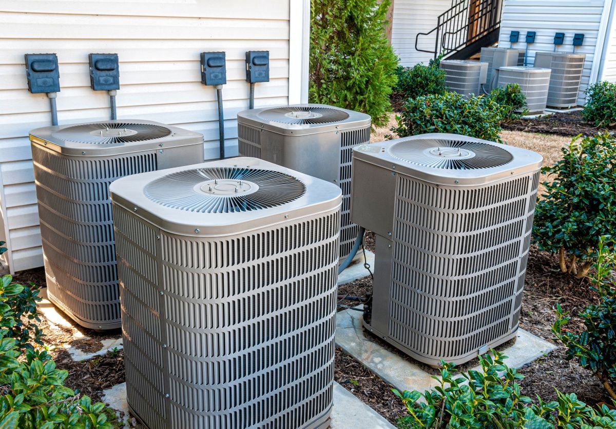 Four AC units outside