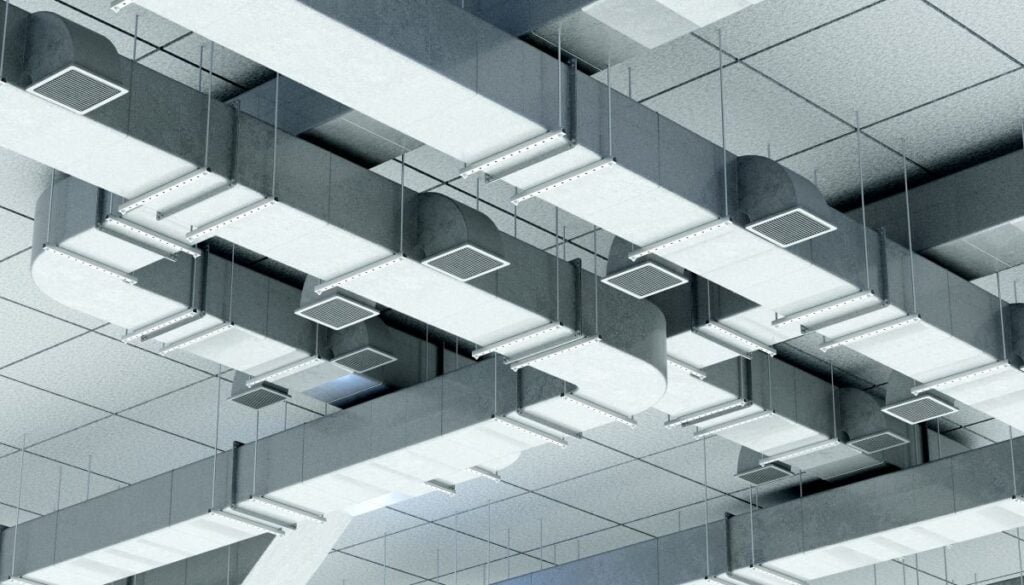 HVAC engineering installs suspended ventilation ducts and air distribution systems in a commercial building